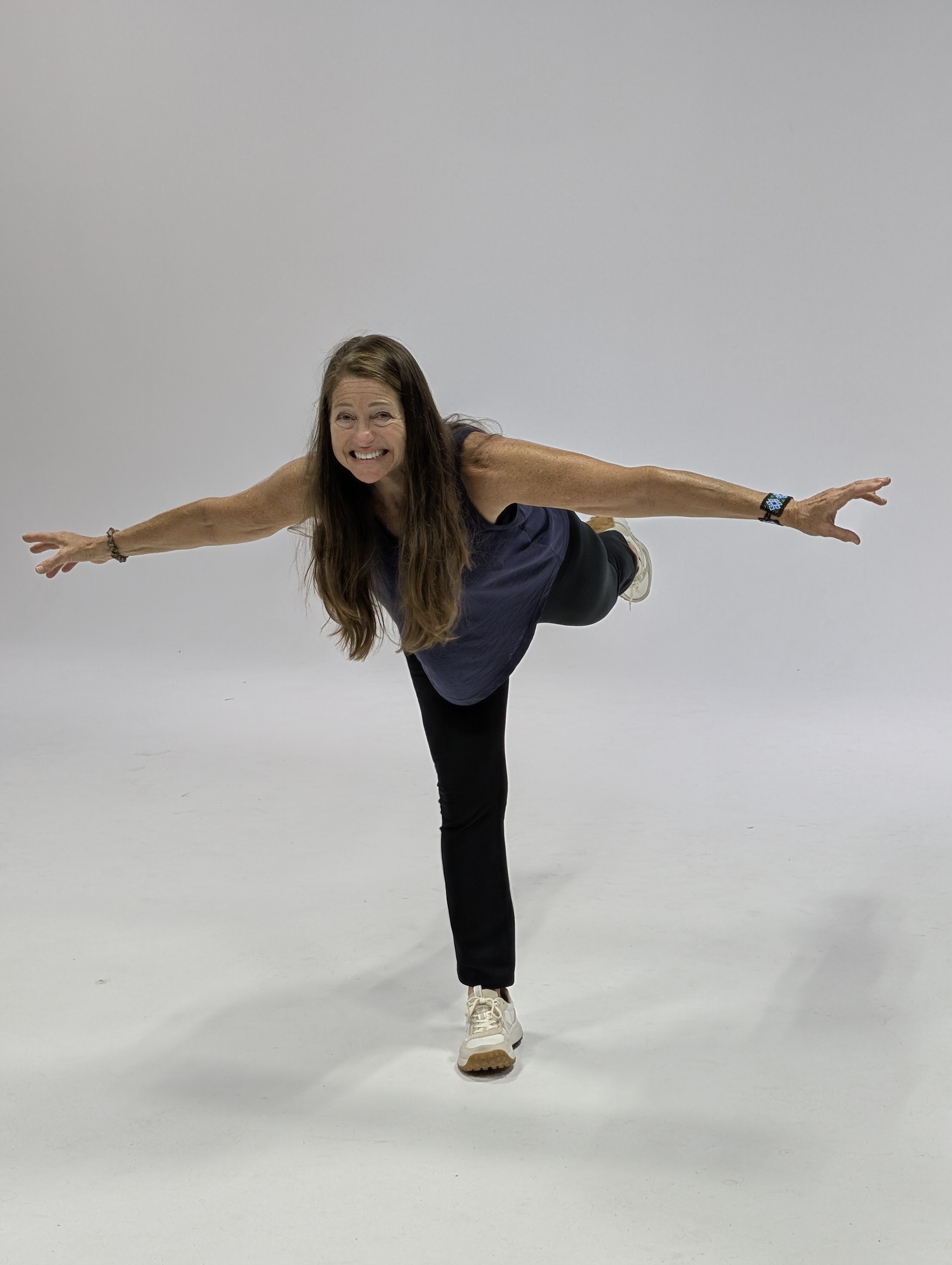 Diana in a warrior pose in studio